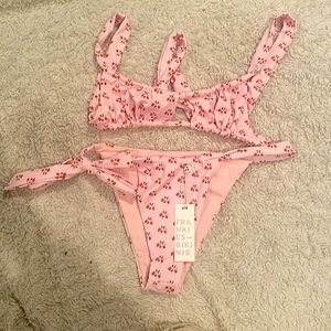 Frankie’s bikini, matching top and bottom, both size small. Never worn. NWT